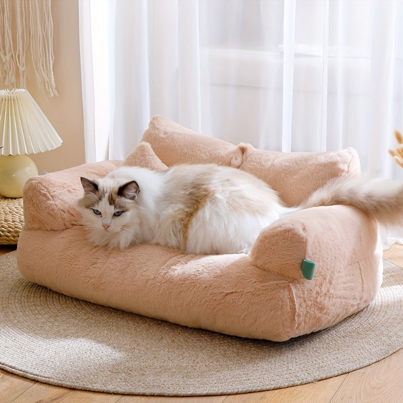 Soft beige plush cat bed with non-slip base, detachable cover, and polyester fill. Ideal for snoozing and relaxing, easy to clean. Perfect for kittens and cats.