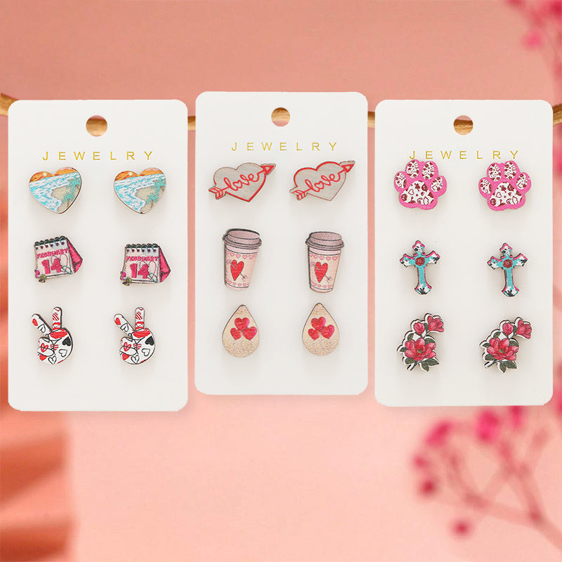 Get 9 pairs of women's fashion earrings for Valentine's Day, including pink rose love earrings, wooden cupid's arrow calendar earrings, coffee cup love earrings, palm bier earrings, and more. These earrings are made from wooden materials and will make