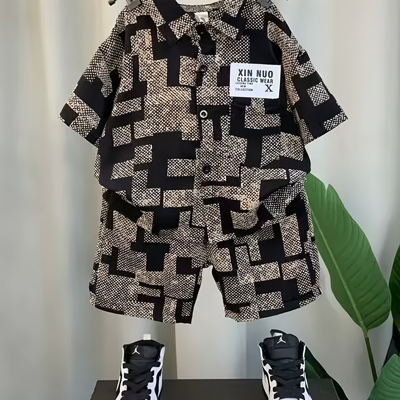 Boys' summer outfit set with casual shirt and shorts in polyester knit fabric with alphabet pattern, suitable for daily and outdoor wear.