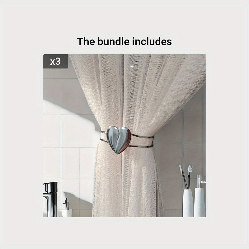 Heart-shaped decor curtain holder made of alloy, featuring a minimalist hollow design. Perfect for use in living rooms, offices, or homes as a stylish and functional curtain accessory.