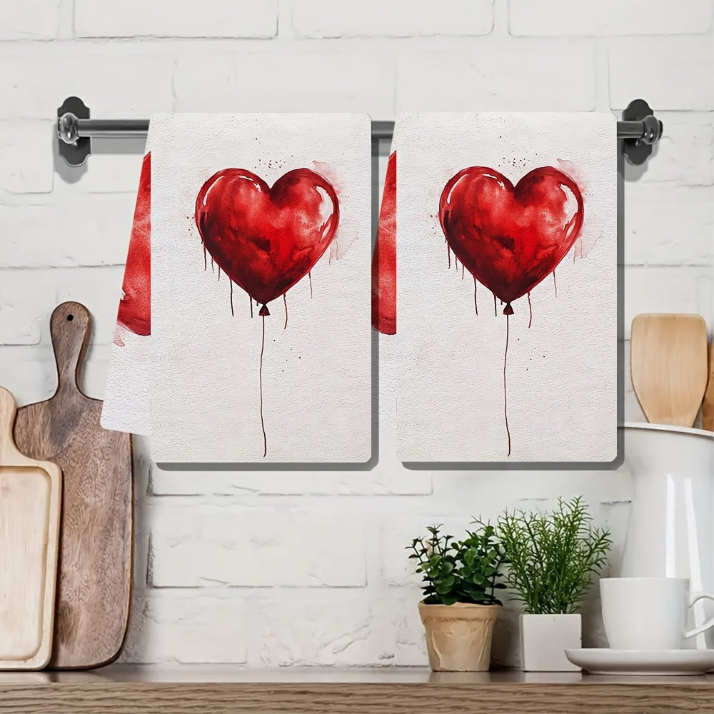 Two pieces of ultra soft kitchen towels featuring a Valentine's Day heart balloon design. These towels are highly absorbent and machine washable, making them perfect for dish and hand drying. With a contemporary style and measuring 40.64x60.96 cm, these