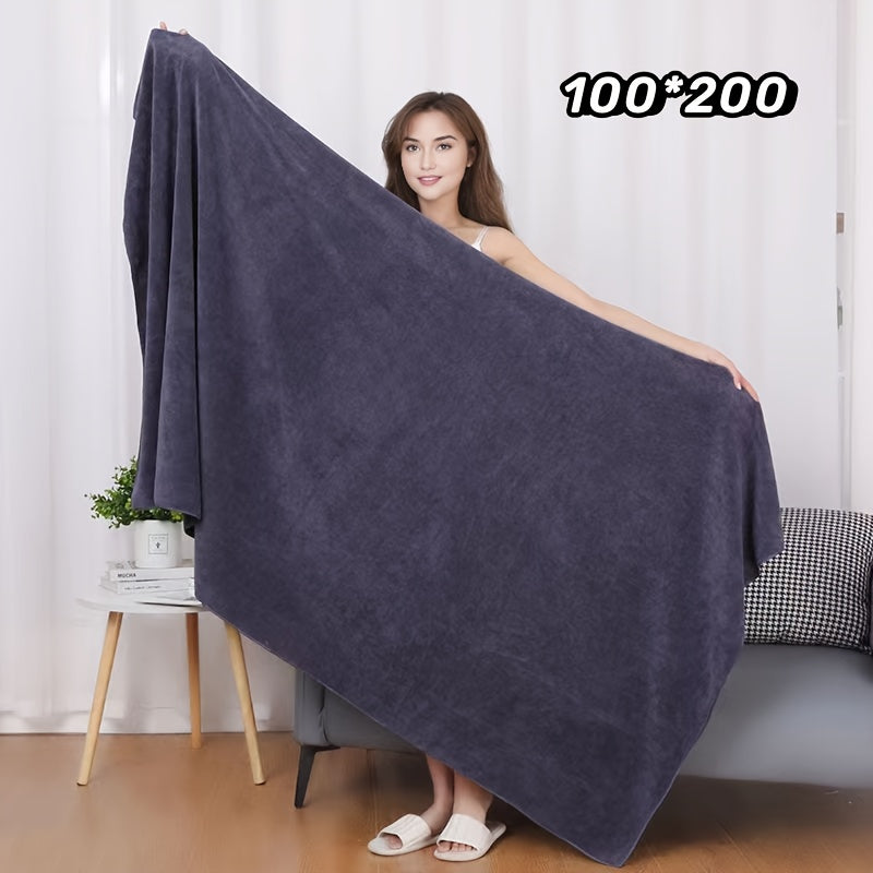 Large, lightweight bath sheet measuring 119.38cm x 200.66cm. Ultra-soft, quick-dry nylon/polyester blend with striped design and modern style, ideal for home use.