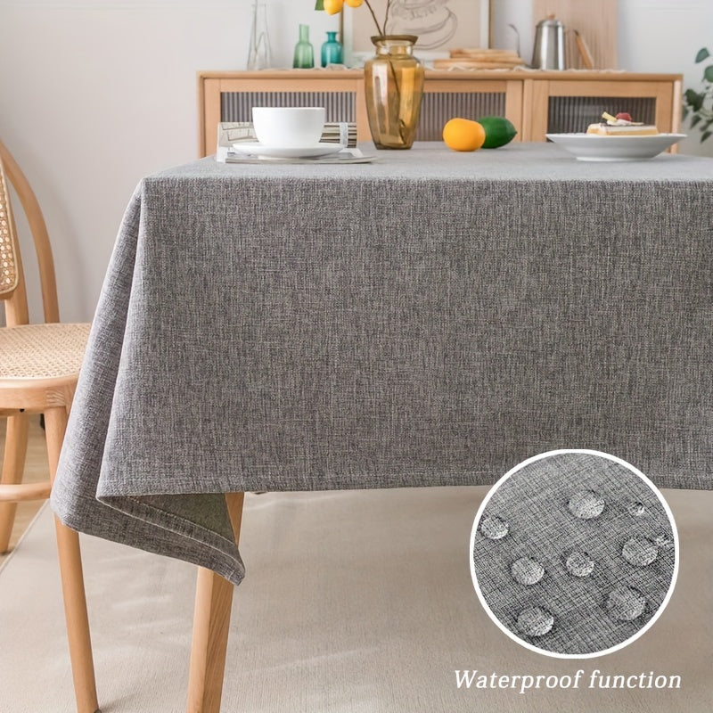 Modern grey polyester tablecloth, waterproof and thickened, machine woven, 100% polyester, for a rectangular dining table.