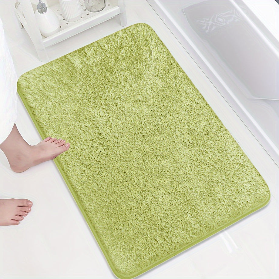 Soft and sumptuous purple bath mat offering luxury feel - highly absorbent, non-slip and fade-resistant, ideal for bathroom, bedroom and laundry room décor. Made from durable polyester, easy to clean.