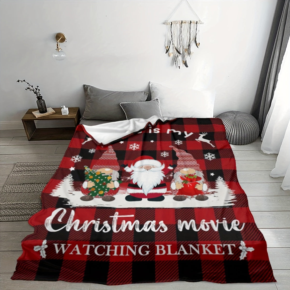 Get cozy this holiday season with our 1-piece Festive Christmas Movie Watching Blanket. This reversible flannel fleece throw features a charming Santa print and a contemporary style. Made with tear-resistant, all-season materials, this multipurpose