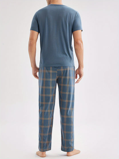 Men's casual blue short-sleeve top and plaid long pants set made of soft polyester for loungewear at home or out.