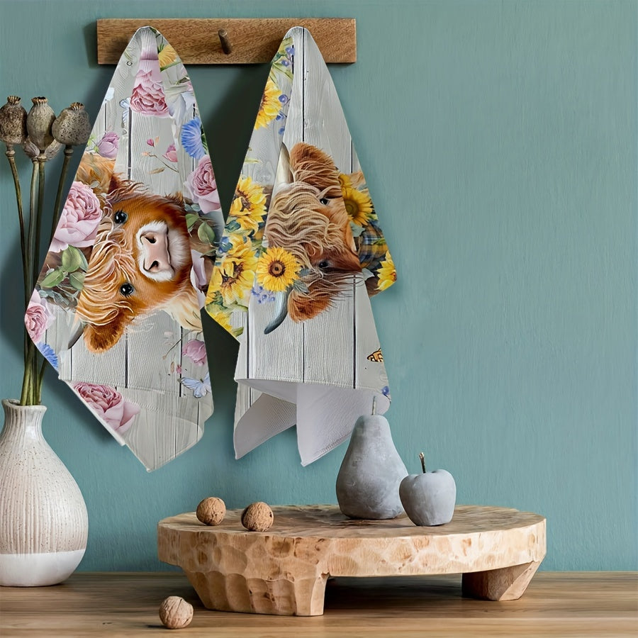 Set of two colorful hand towels with sunflower cow pattern, farmhouse style. Perfect for kitchen or bathroom use.