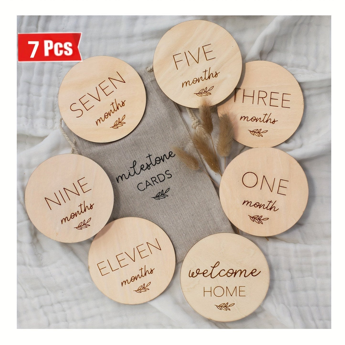 Celebrate baby's first year with the Yuebaaf 7-piece Reversible Wooden Milestone Cards Set! This set includes milestone cards featuring 'Hello World' and Announcement signs, perfect for monthly photo props. Made from durable fiberboard discs, these cards