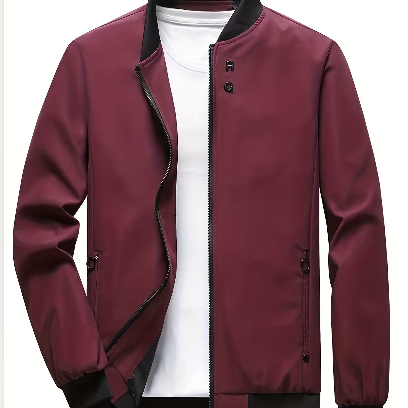 Casual long-sleeved jacket with zip, stand collar, pockets, and slim fit; ideal for spring and autumn.