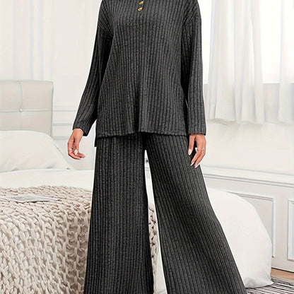 Women's casual suit with ribbed knit top and matching hooded wide-leg pants.