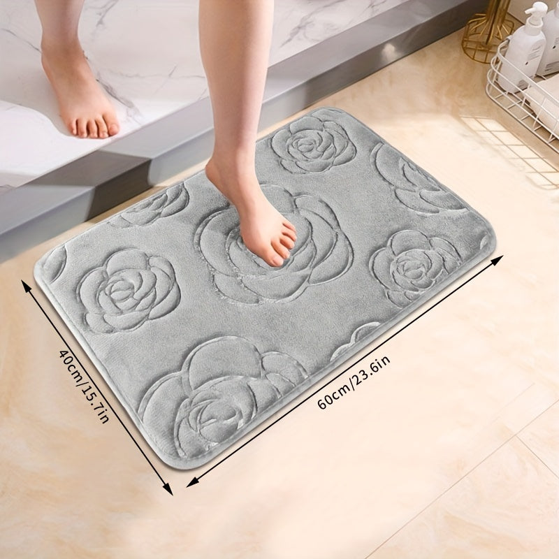 Soft and luxurious bath mat featuring a beautiful rose embossed design. This non-slip bathroom rug is made of ultra-soft knit polyester, providing superior comfort and absorbency. Lightweight and washable, this versatile mat is perfect for use in the