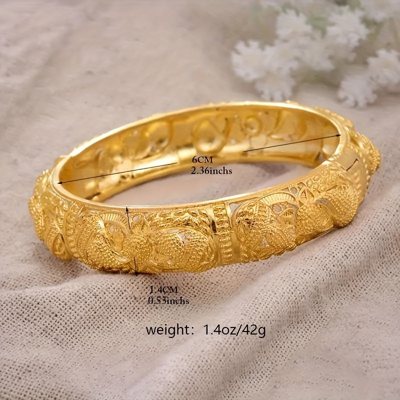 Handcrafted from 24K gold plated copper, this cuff bracelet features a tribal luxury hollow flower design. It makes for a stunning traditional engagement or wedding jewelry gift for women, with no mosaic material used in its creation. Perfect for daily