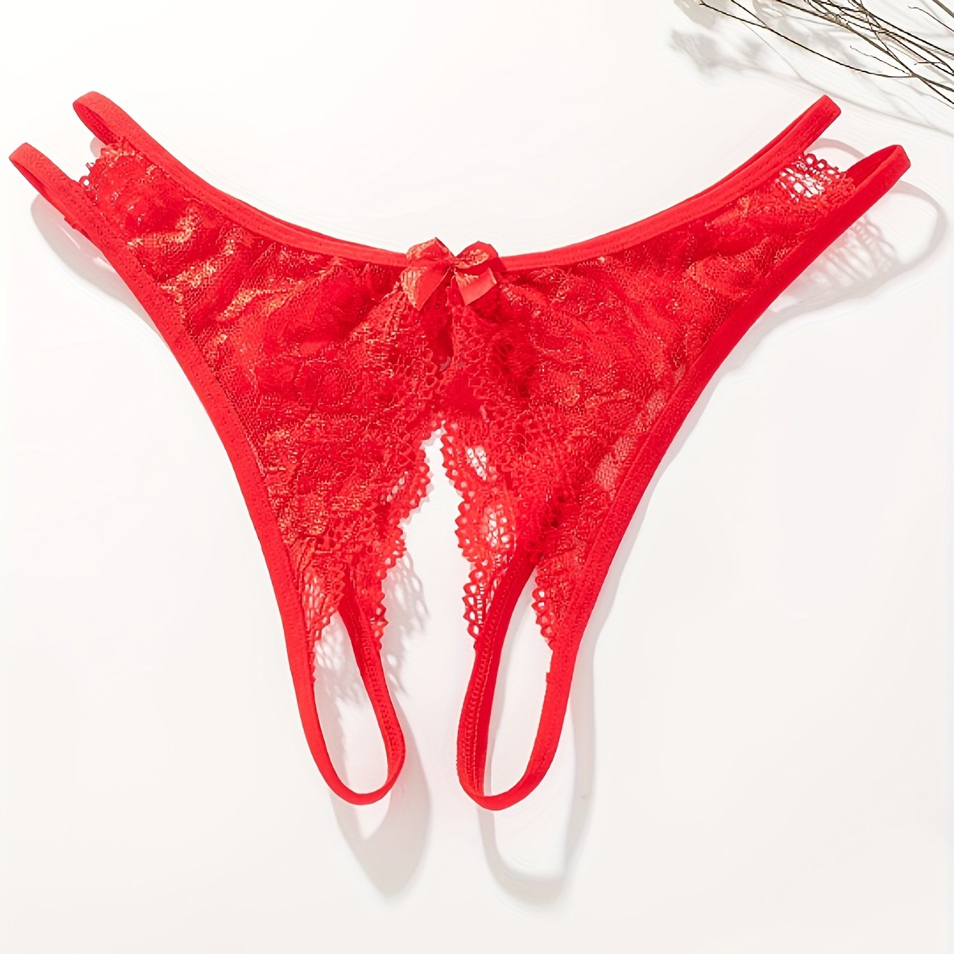 Floral lace thong with open crotch and bow detail - Women's lingerie.