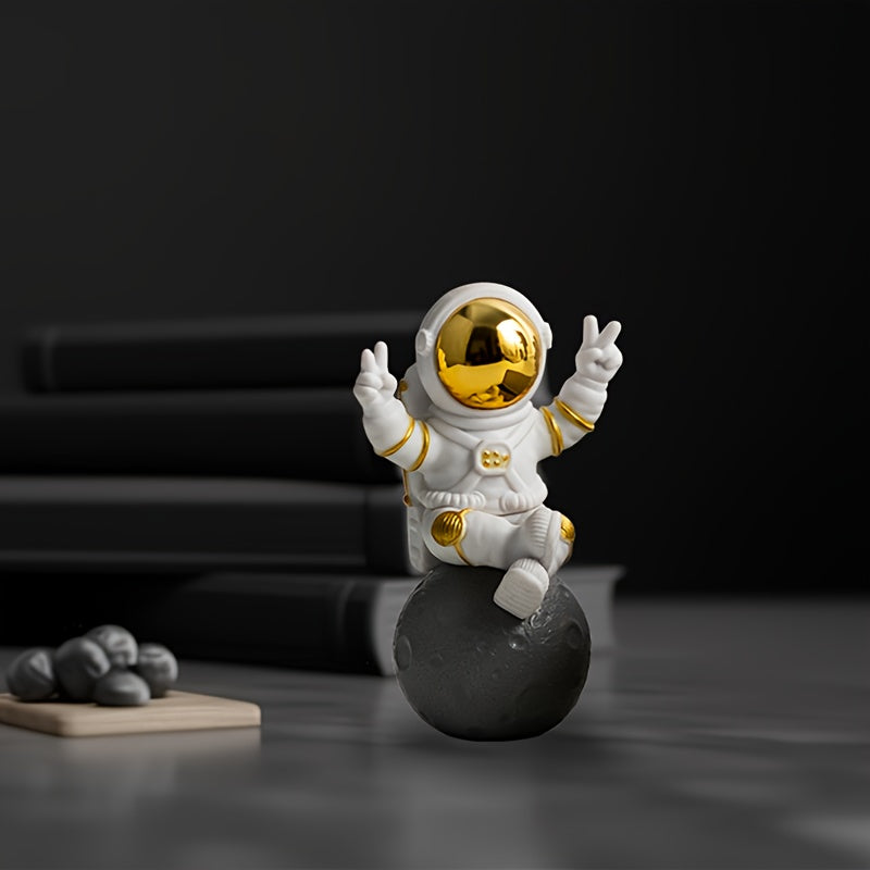 Chic astronaut figurine set with golden egg decor - perfect for home or office; great birthday gift for space enthusiasts.