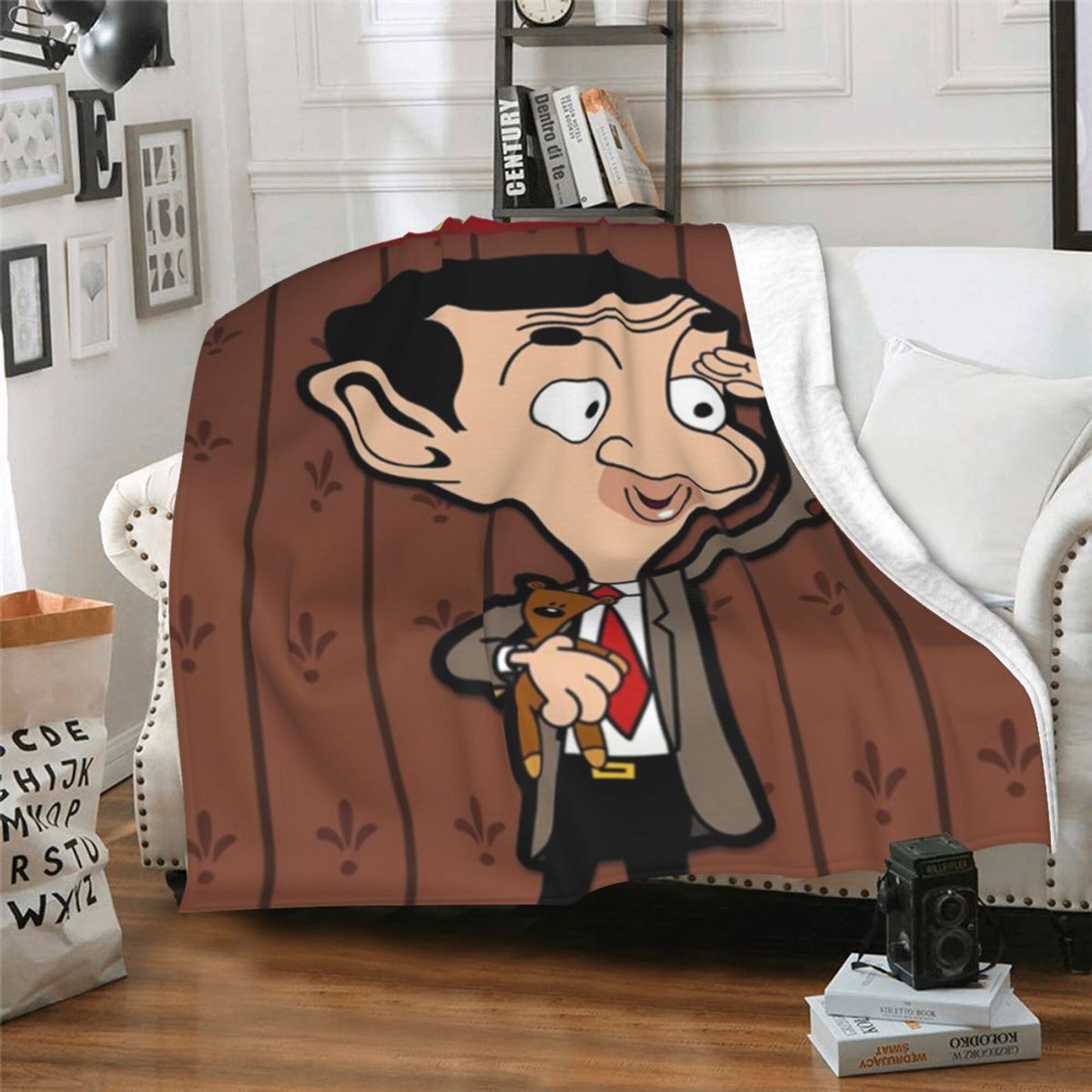 Soft, lightweight Mr. Bean flannel nap blanket, the perfect stress-relief throw for office naps. Ideal for all seasons, this cozy cartoon blanket is made of polyester and makes a great gift for friends and family. It features a digital print, making it a