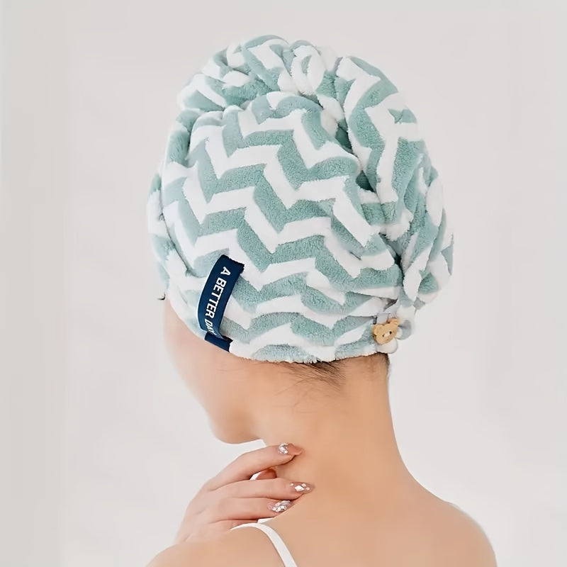 Modern blue and white striped hair towel wrap with button closure. Ultra-soft, absorbent, and low-shedding. Perfect for quick drying in a space-themed bathroom.