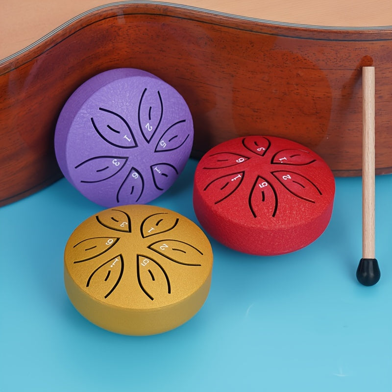 Mini steel tongue drum set with 6 notes, mallets, music book, case, and accessories.