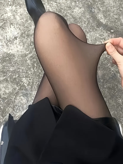 Thick black tights for fall and winter with reinforced toes and heels, hand washable, stretchy nylon blend, mid-rise design.