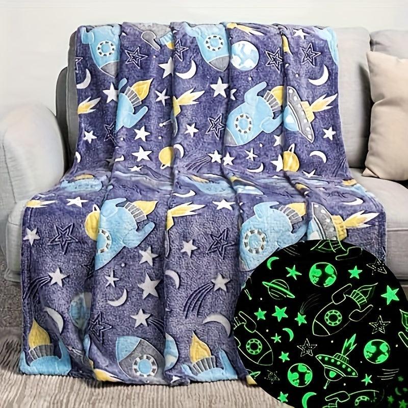 One piece of contemporary style throw blanket featuring glow in the dark space theme. Made of knitted all-season polyester, this bed blanket has active printing with a cartoon rocket and stars pattern. It is soft and can be used as a sofa cover. An ideal