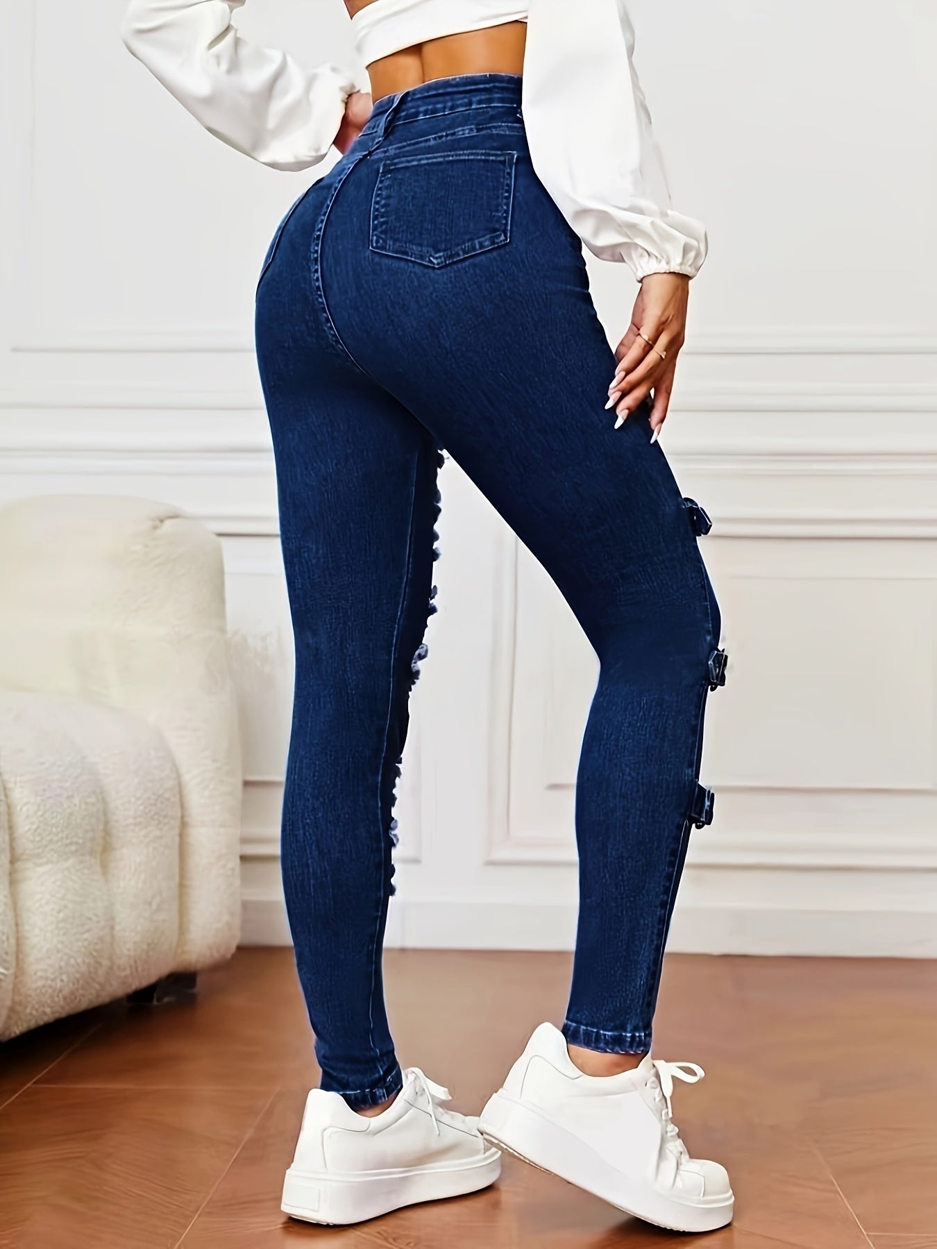 High-waisted denim jeans for women with ripped knees, stretch fabric blend, versatile fit for all seasons, machine washable.