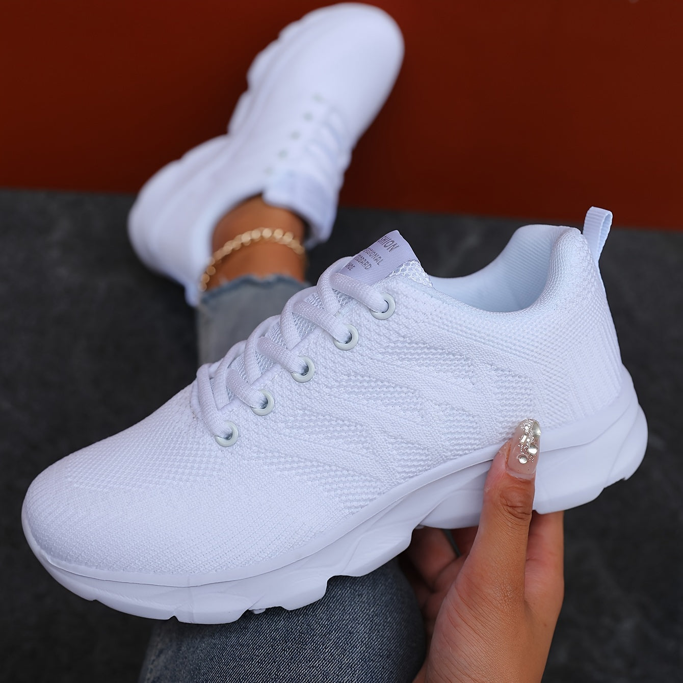 Breathable women's sneakers for casual outdoor activities, lightweight and low-top for running.