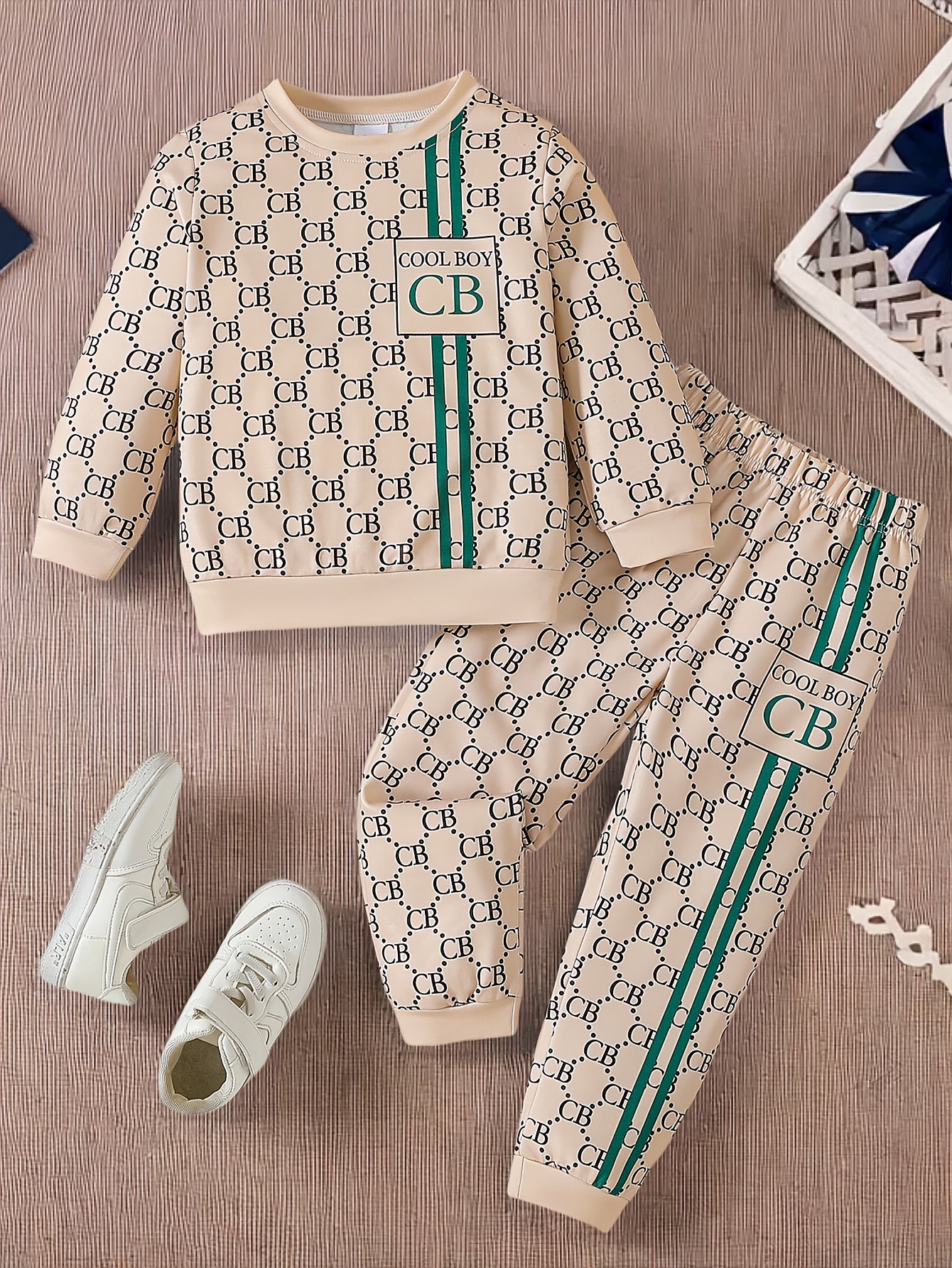 Set of 2 boys' casual crew neck long sleeve T-shirt and pants with alphabet pattern. Made of knit polyester and spandex in a regular fit with medium stretch. Suitable for spring/fall