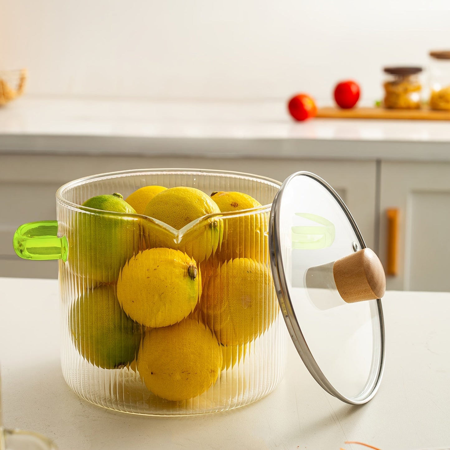 Glass cooking pot set includes two pieces with lids. The transparent glass pot is perfect for cooking various dishes such as noodles, Italian pasta, soup, and milk-based foods. Features a covered stew pot with double handles for easy handling in the