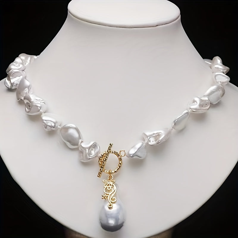 Stylish and unique pearl pendant necklace with a trendy design.