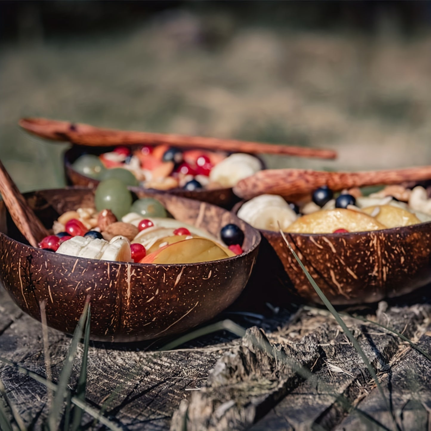 one set of 4: two coconut bowls, two wooden spoons, ideal for healthy vegetarian salads and ice cream, made from natural coconut.