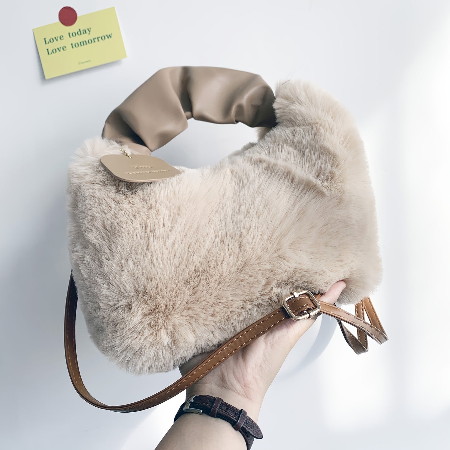 Stylish plush crossbody bag for women in faux fur with adjustable strap and zip closure. Perfect for fall/winter in khaki, light grey, dark khaki, cream, or pink.