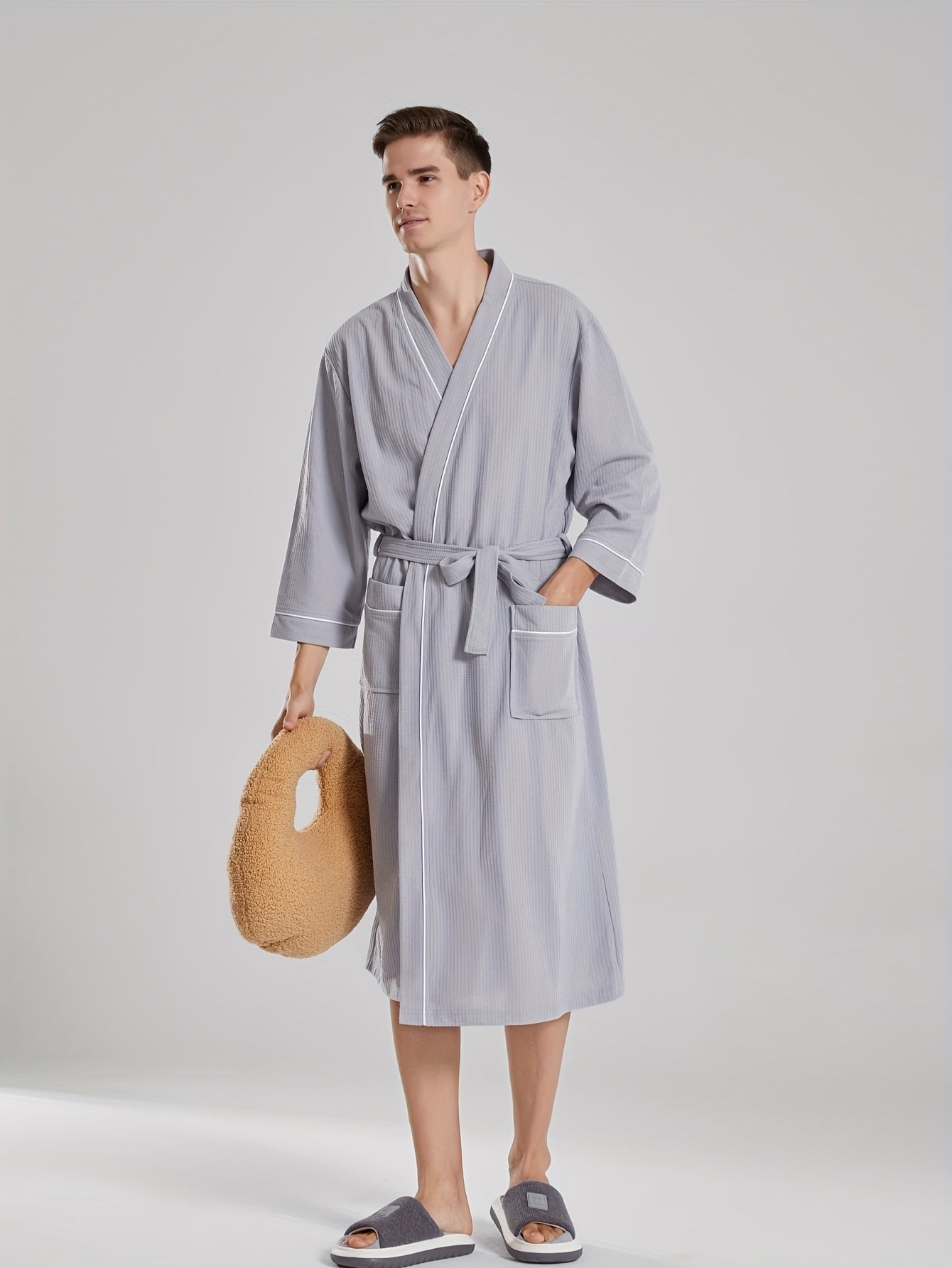 Unisex Japanese-style bathrobe with waffle weave, pockets, and belt for all-season comfort.