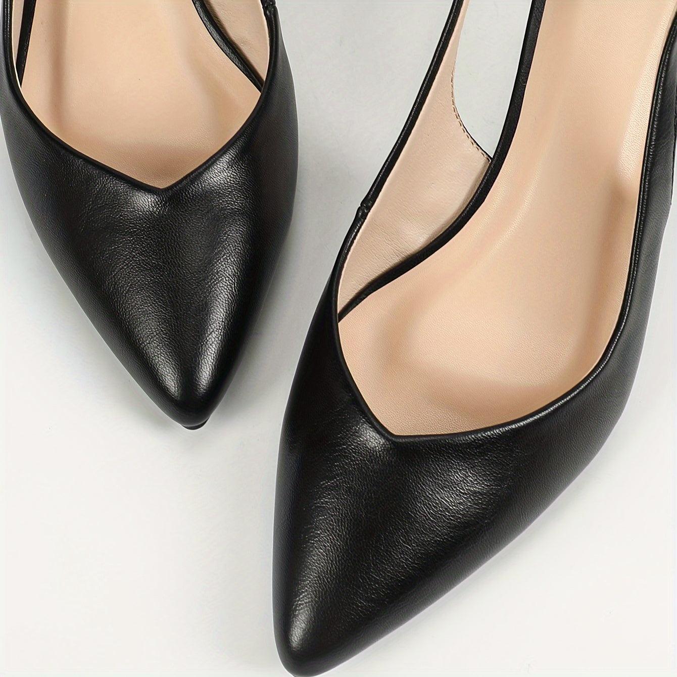 Chic and comfy pointed-toe kitten heel sandals for work.