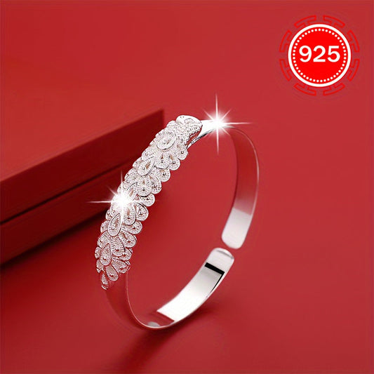 This one pack of 925 silver hypoallergenic fashion open bracelet features a women's peacock design with filigree embossed details, giving it a vintage look. An ideal gift for couples, girlfriends, or loved ones, this bracelet is perfect for daily wear