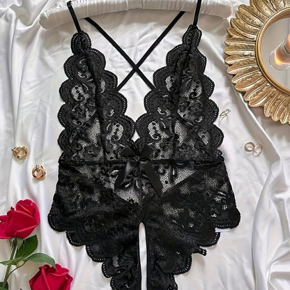 Sexy lace bow teddy with open crotch and strappy backless design, perfect for women's lingerie.