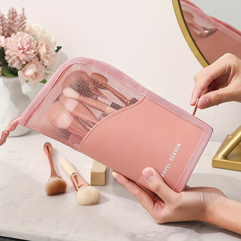 Waterproof wash bag with travel-friendly makeup brush storage, compartmentalized cosmetic storage, and a clear, transparent design.