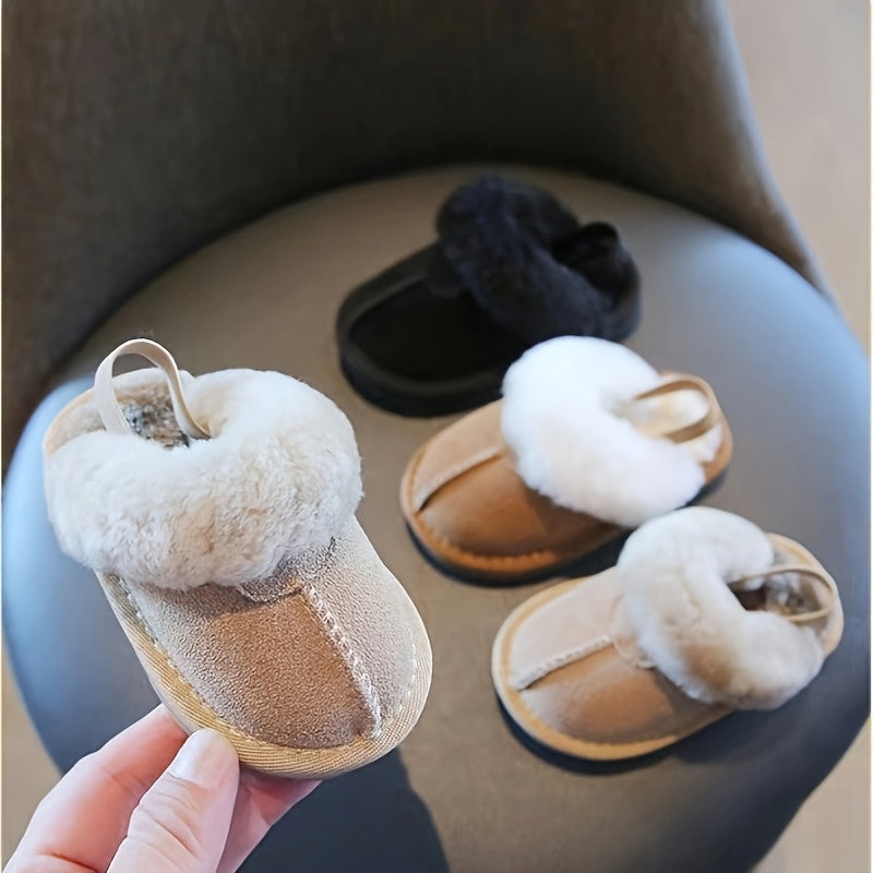 Soft and cozy plush baby girl slippers with non-slip sole for indoor comfort, perfect for 0-1 year olds in spring and fall.