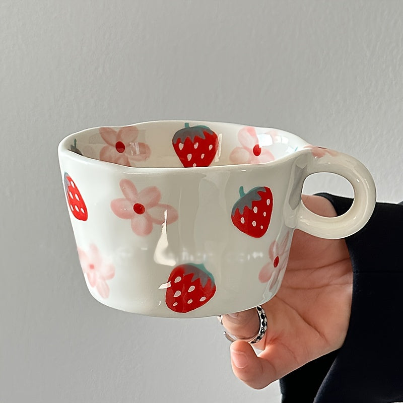 Unique hand-painted ceramic mug with a charming strawberry and floral design, perfect for coffee or tea. Ideal Valentine's Day gift, reusable and high-quality, featuring an irregular art style.