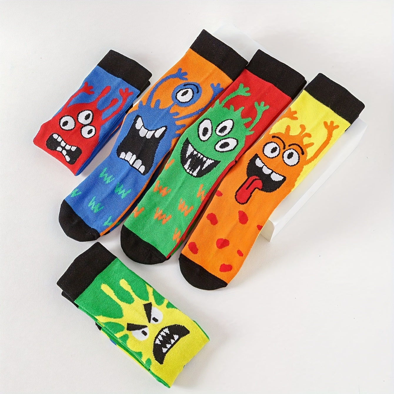 5/10 sets of men's or women's funny pattern mid-tube socks for all seasons.