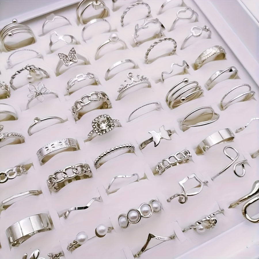 Pack of 30 simple butterfly love alloy rings for women, featuring an elegant and versatile mixed style. Perfect for party, wedding, or daily wear. Each set includes multiple pieces. Rings will be randomly shipped in OPP bag packaging.