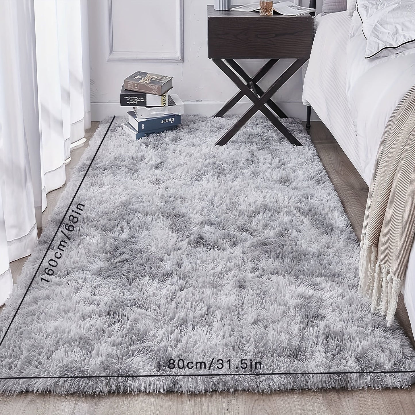 Luxurious soft plush shag area rug perfect for the living room, fluffy shaggy floor carpet ideal for the bedroom. This home decor piece adds warmth and style to any space. Non-slip and machine washable, it's perfect for the living room, bedroom, game