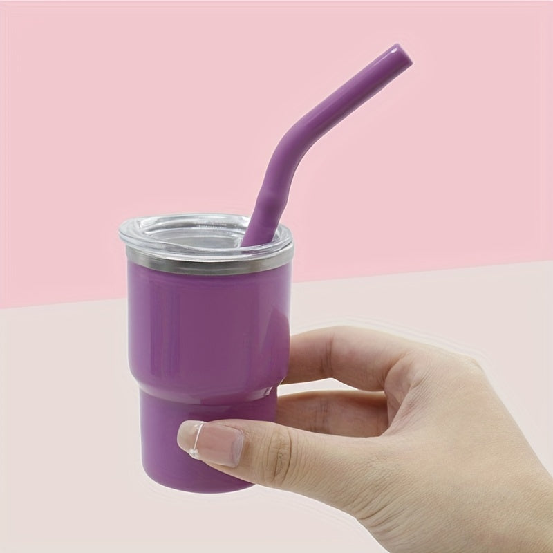 A 3oz car cup pack containing an outer plastic and inner steel construction, with a stainless steel stretch liner and a silicone sleeve straw.