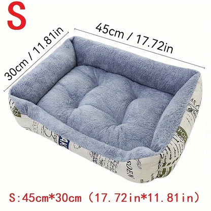 Soft light blue dog bed with newspaper print border, suitable for small, medium, and large dogs. Provides all-season warmth and comfort. Stylish and warm pet cushion.