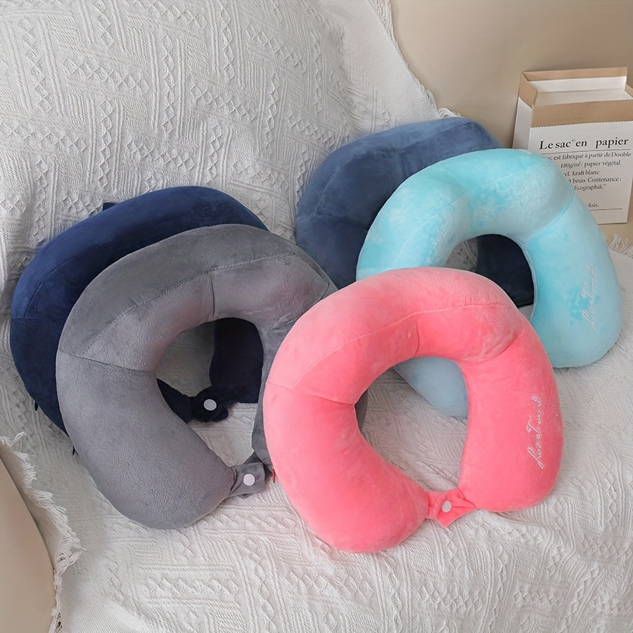 Soft and portable travel pillow in U shape, perfect for neck support on planes, trains, and cars. Ideal for a comfortable rest while traveling.