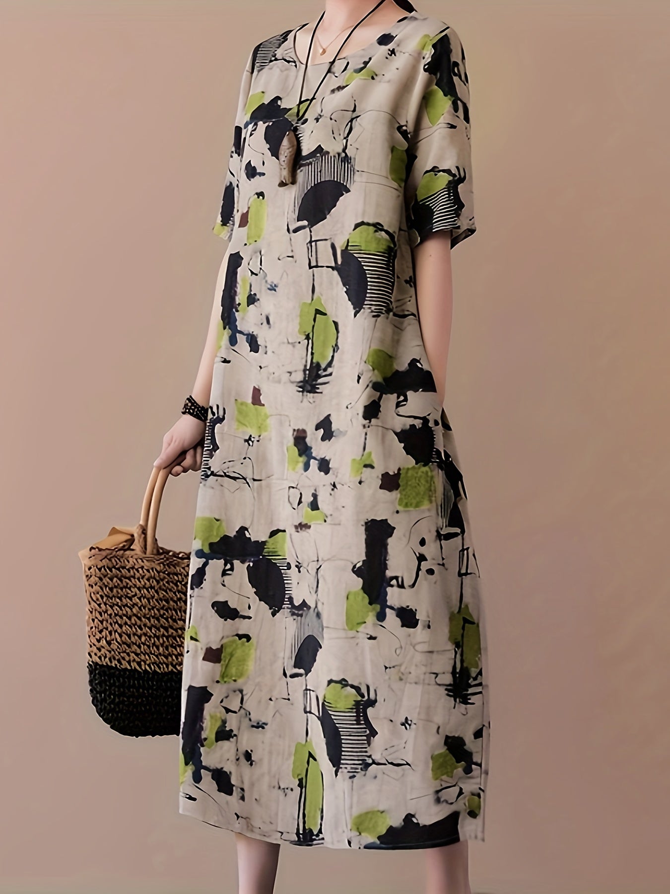 Elegant linen midi dress with vibrant abstract print, short sleeve, round neck, machine washable, no stretch - perfect for spring/summer/fall events.