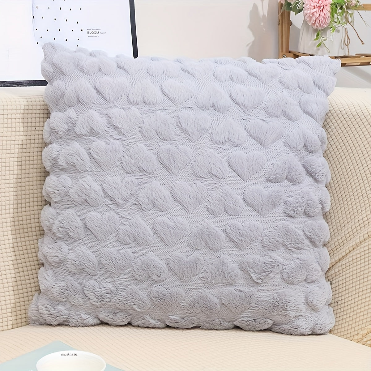 One set of cute beige decorative throw pillow covers, 18x18, made of soft plush faux fur wool for couch or sofa décor.