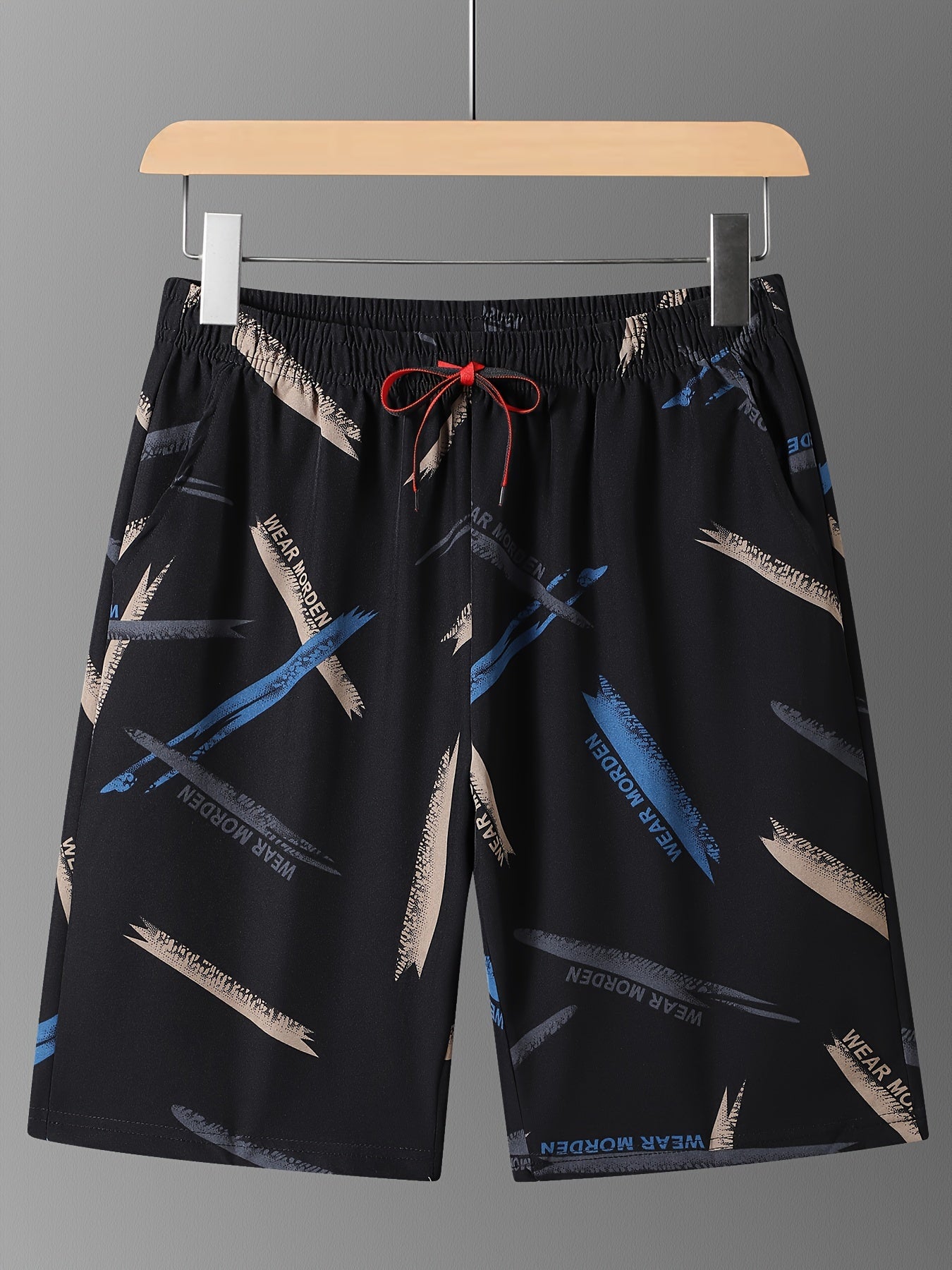 Men's summer knee-length shorts made of breathable polyester (92%) and spandex (8%) fabric with a unique print. Ideal for leisure activities, fashionable and trendy.