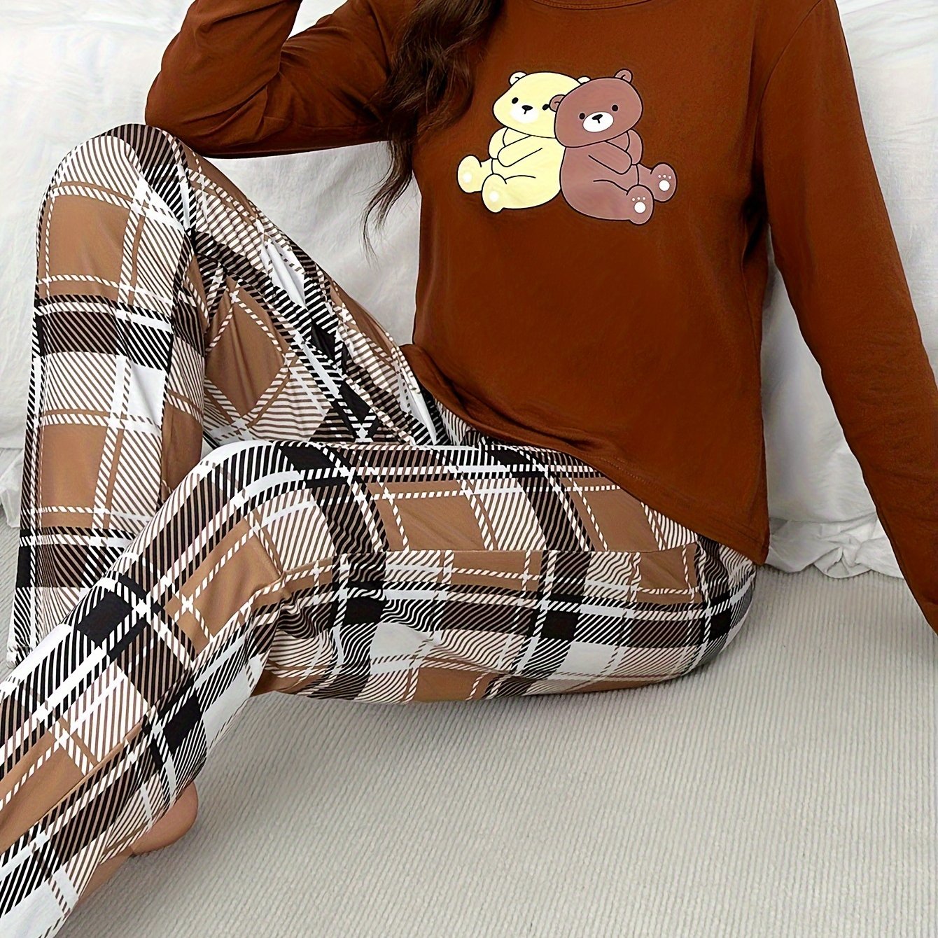 Cozy plaid pajama set for women, perfect for autumn.