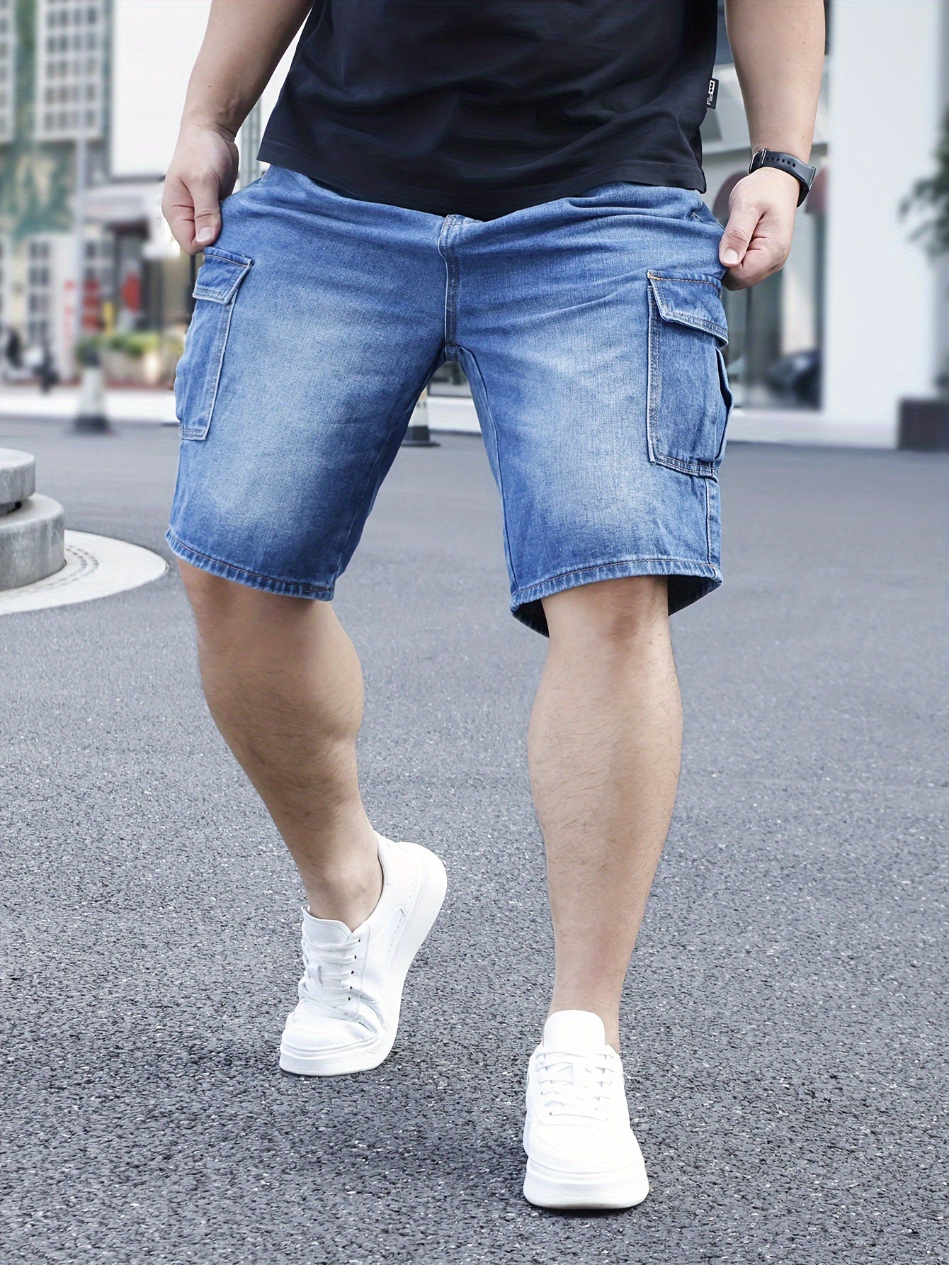 Men's plus size light blue denim shorts with casual fit, pockets, and classic style for casual attire.