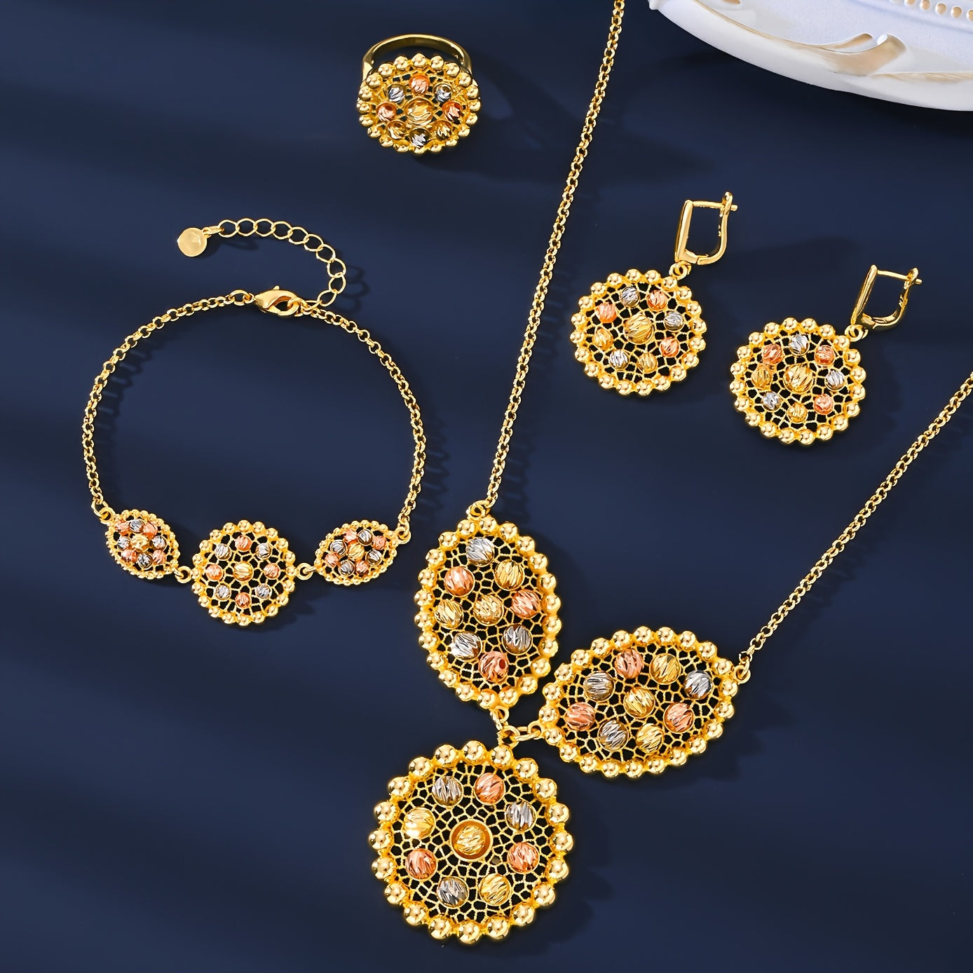 Luxurious MEIZ jewelry set featuring 18K gold-plated pieces in Bohemian and Arabian styles. Set includes necklace, earrings, ring, and bracelet all made with high-quality copper. Versatile for daily wear or gifting, perfect for Ramadan and all seasons.