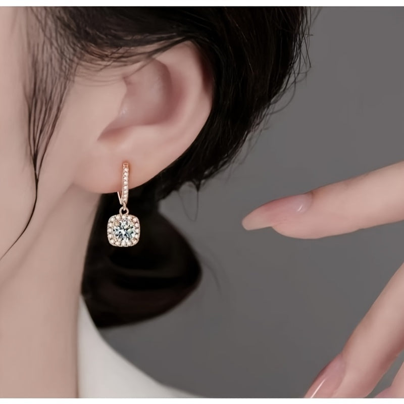 Luxurious and elegant, these 925 sterling silver Moissanite drop earrings are perfect for women on all occasions. With a gold plating and 6.5mm size, they are the perfect accessory for daily wear or special events such as weddings, parties, banquets